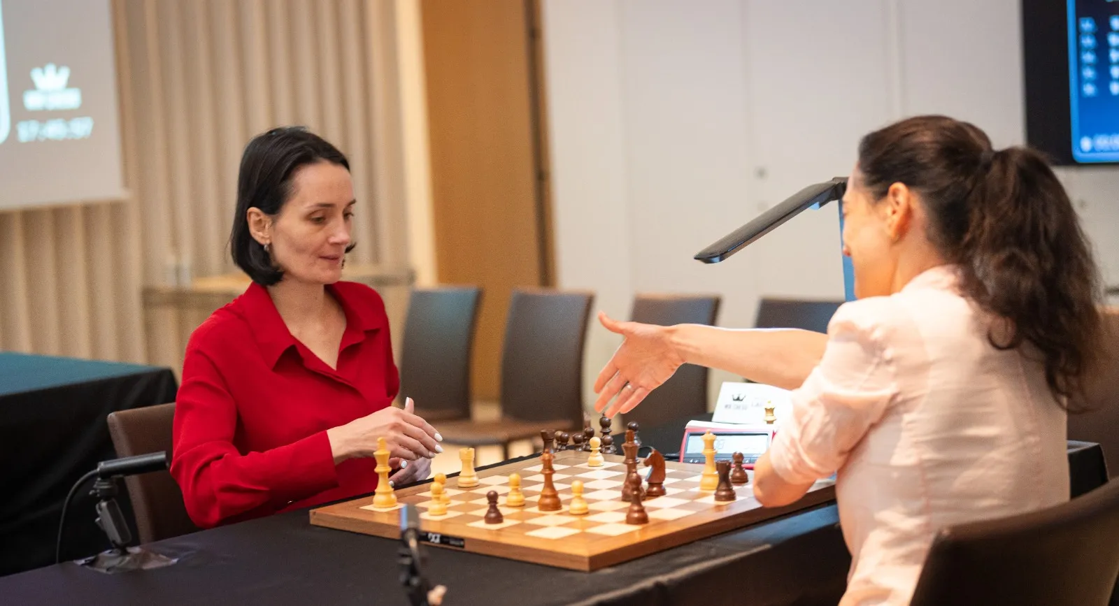 The veterans' final: Kateryna Lagno (left) and Alexandra Kosteniuk shake hands before the deciding match for the Tokyo Blitz title and the second Grand Final spot. The veterans' final: Kateryna Lagno (left) and Alexandra Kosteniuk shake hands before the deciding match for the Tokyo Blitz title and the second Grand Final spot.