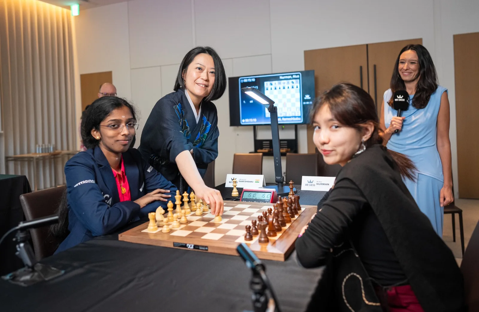 Madoka Kitao arrived in a kimono to open the final between Vaishali (left) and Nurman. Madoka Kitao arrived in a kimono to open the final between Vaishali (left) and Nurman.